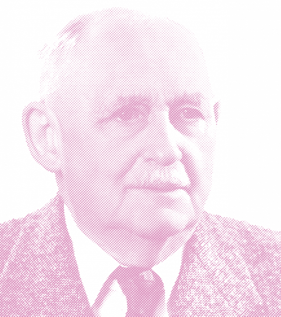 Ein Portrait von Karl Lehrbach Junior. Er trägt einen Anzug mit Krawatte und hat einen kurzen Schnurbart. Das Bild ist monochrom in einem rosa Farbton gehalten und wirkt wie eine stilisierte Druckgrafik im Rasterpunkt-Stil.
